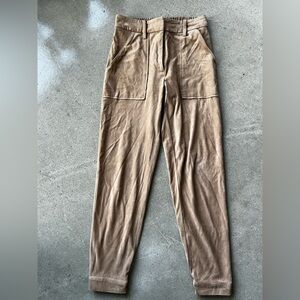 Suede pants color Khaki used.Comes with belt and zipper, button & clasps.Size xs